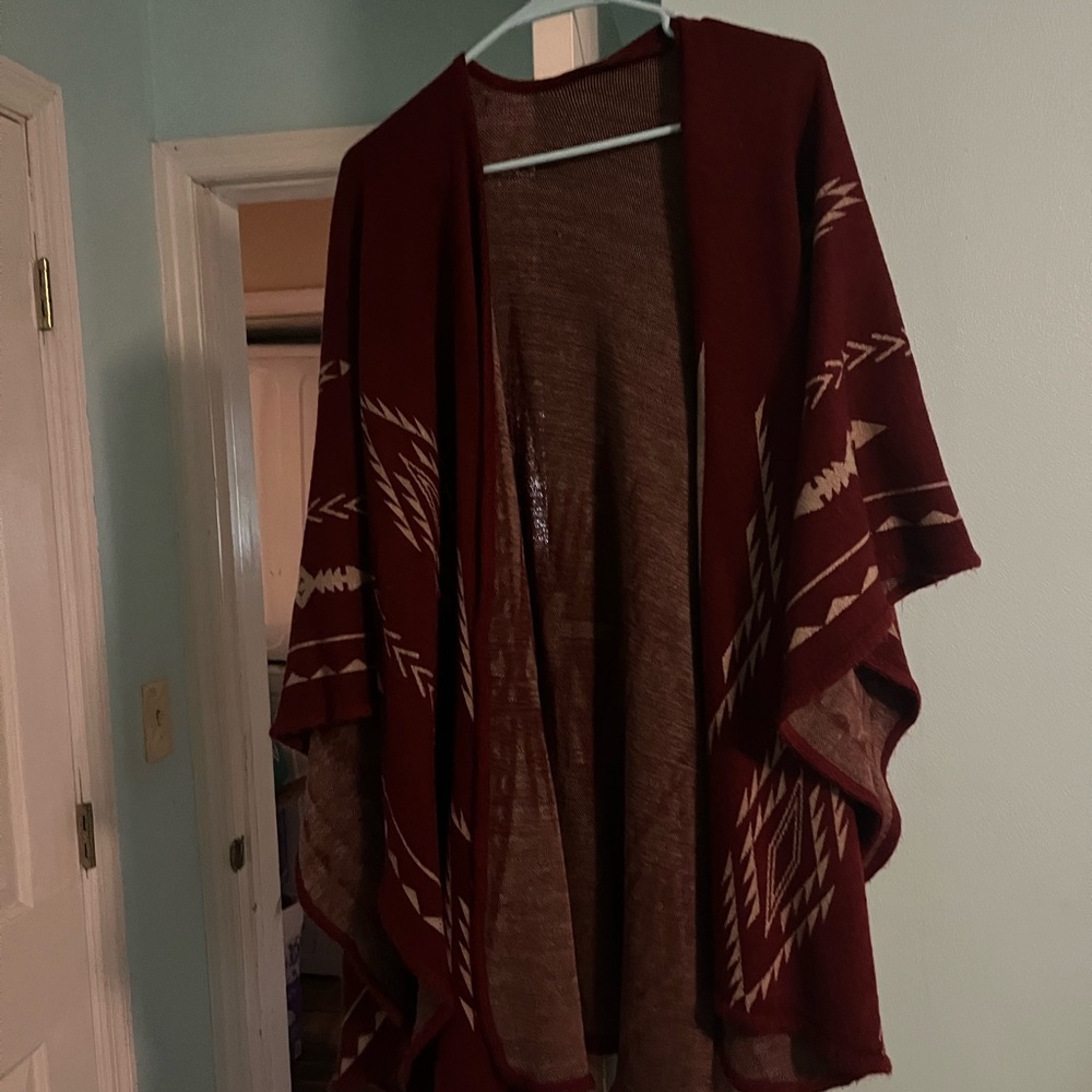 Red and white poncho cardigan.